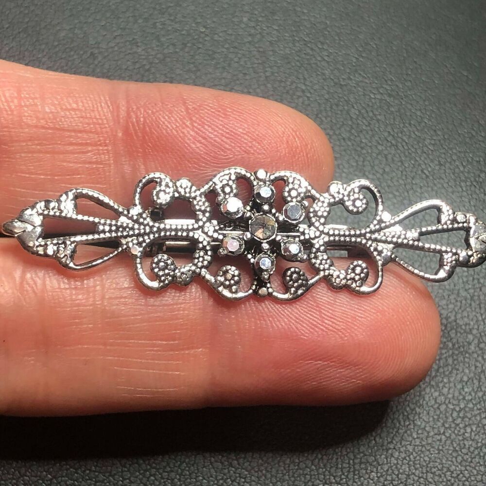 3551 Vintage silvertone faux marcasite Filligree scroll brooch pin